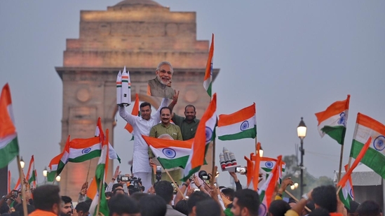 Indian across the country celebrated with fireworks, chants of ‘Vande Matram’ and waving flags as ISRO's moon mission Chandrayaan-3 landed on Moon on Wednesday. (Hindustan Times)