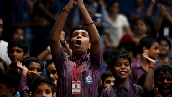 School students watching the live telecast of Chandrayaan-3 landing on the Moon at Sector 20 Brahmananda Public School, in Noida, India, on Wednesday. (Hindustan Times)