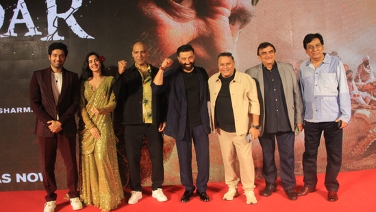 Gadar 2 team including director Anil Sharma, actors Sunny Deol, Utkarsh Sharma, Simrat Kaur and Manish Wadhwa pose for paparazzi at Gadar 2 success bash. 