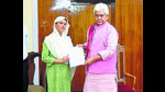 Lieutenant Governor Manoj Sinha handing over a job letter to a beneficiary on Tuesday. (HT Photo) Lieutenant Governor Manoj Sinha handing over a job letter to a beneficiary on Tuesday. (HT Photo)