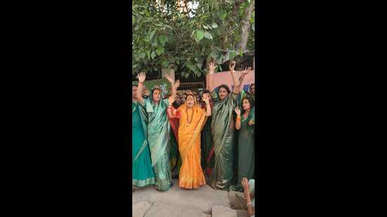 Kinnar Akhada Mahamandaleshwar (high priest) Swami Kaushalyanand Giri (in yellow sari) with her supporters in Prayagraj. (HT) Kinnar Akhada Mahamandaleshwar (high priest) Swami Kaushalyanand Giri (in yellow sari) with her supporters in Prayagraj. (HT)