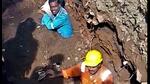 Three workers were half-buried in the pit being dug for a piped gas line in Ambernath on Wednesday (Pamod Tambe/HT PHOTO) Three workers were half-buried in the pit being dug for a piped gas line in Ambernath on Wednesday (Pamod Tambe/HT PHOTO)