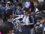 Students doing their last-minute revision, outside their examination centre at a school in Gole Market, New Delhi on Monday. (Burhaan Kinu/HT PHOTO) Students doing their last-minute revision, outside their examination centre at a school in Gole Market, New Delhi on Monday. (Burhaan Kinu/HT PHOTO)