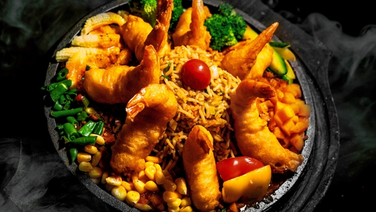 Prawn sizzler with garlic sauce. The restaurants are coming up with unique combos to serve the rising demands of sizzlers. 