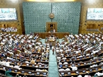 Members of Parliament voting on clauses of the Women's Reservation Bill in the Lok Sabha in New Delhi on September 20, 2023. (ANI/Sansad TV) Members of Parliament voting on clauses of the Women's Reservation Bill in the Lok Sabha in New Delhi on September 20, 2023. (ANI/Sansad TV)