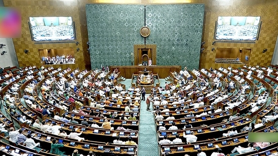 Members of Parliament voting on clauses of the Women's Reservation Bill in the Lok Sabha in New Delhi on September 20, 2023. (ANI/Sansad TV) Members of Parliament voting on clauses of the Women's Reservation Bill in the Lok Sabha in New Delhi on September 20, 2023. (ANI/Sansad TV)