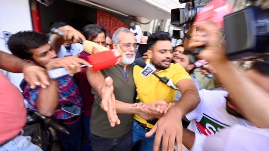 NewsClick editor-in-chief Prabir Purkayastha being taken by the Delhi Police from his office in Saket.(Raj K Raj) NewsClick editor-in-chief Prabir Purkayastha being taken by the Delhi Police from his office in Saket.(Raj K Raj)