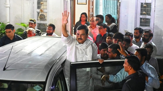 AAP MP Sanjay Singh taken in to custody by the ED officials from his residence at North Evnue in the evening.(Vipin Kumar/Hindustan Times) AAP MP Sanjay Singh taken in to custody by the ED officials from his residence at North Evnue in the evening.(Vipin Kumar/Hindustan Times)