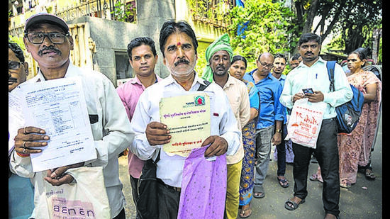 The verification process started on September 15 and will continue for three months. Sixty-three-year-old Shankar reached the city from Hyderabad at 7am on Thursday, and the journey cost him <span class='webrupee'>₹</span>700. “We’ve been standing in this queue since 8am. They’ve given out tokens for the day, and they’re saying they will not let us in. I don’t have any space to stay tonight,” he said (Satish Bate/ HT PHOTO) The verification process started on September 15 and will continue for three months. Sixty-three-year-old Shankar reached the city from Hyderabad at 7am on Thursday, and the journey cost him <span class='webrupee'>₹</span>700. “We’ve been standing in this queue since 8am. They’ve given out tokens for the day, and they’re saying they will not let us in. I don’t have any space to stay tonight,” he said (Satish Bate/ HT PHOTO)