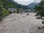 Buildings inundated after flash floods. (AP) Buildings inundated after flash floods. (AP)