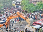 Rescue operation underway near Raghunathpur station in Bihar’s Buxar district on Thursday. (PTI) Rescue operation underway near Raghunathpur station in Bihar’s Buxar district on Thursday. (PTI)