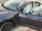 Damaged Tesla car after Hamas attack.(X/@mluggy) Damaged Tesla car after Hamas attack.(X/@mluggy)