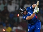 England's captain Jos Buttler is clean bowled during the 2023 ICC Men's Cricket World Cup one-day international (ODI) match between England and Afghanistan (AFP) England's captain Jos Buttler is clean bowled during the 2023 ICC Men's Cricket World Cup one-day international (ODI) match between England and Afghanistan (AFP)