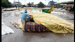 Labourers at the grain market in Bathinda. (HT File) Labourers at the grain market in Bathinda. (HT File)
