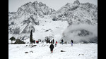 Tourists enjoying after snowfall in Sonamarg, approximately 90km from Srinagar, on Tuesday. (Waseem Andrabi/HT) Tourists enjoying after snowfall in Sonamarg, approximately 90km from Srinagar, on Tuesday. (Waseem Andrabi/HT)