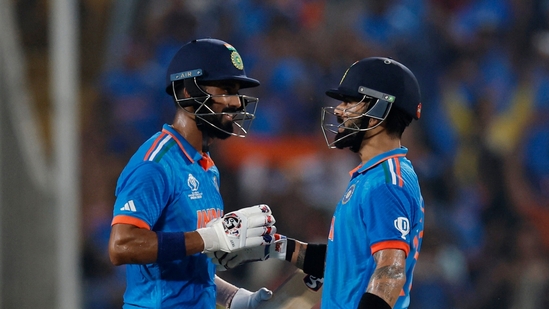 India's Virat Kohli celebrates reaching his century and winning the match with KL Rahul(REUTERS)