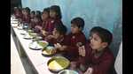 MDM being served to kids in a government-run primary school in Prayagraj (HT file) MDM being served to kids in a government-run primary school in Prayagraj (HT file)