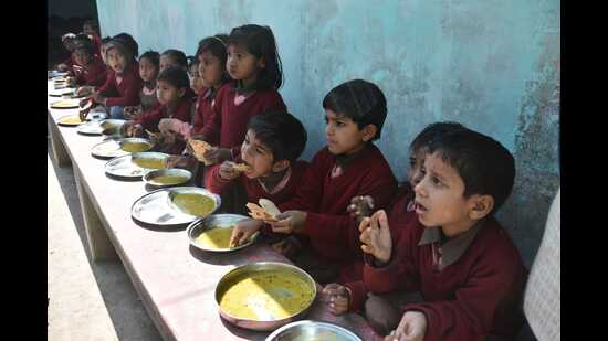 MDM being served to kids in a government-run primary school in Prayagraj (HT file) MDM being served to kids in a government-run primary school in Prayagraj (HT file)