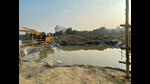 Hydra machines and cranes have been stationed at the temporary ponds dug at Jhulelal Park, for immersion proceedings on Dashami. (HT Photo) Hydra machines and cranes have been stationed at the temporary ponds dug at Jhulelal Park, for immersion proceedings on Dashami. (HT Photo)