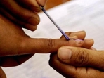 A polling official marks a voter with indelible ink prior to casting a ballot.(AFP File Photo) A polling official marks a voter with indelible ink prior to casting a ballot.(AFP File Photo)