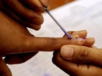 A polling official marks a voter with indelible ink (AFP File Photo) A polling official marks a voter with indelible ink (AFP File Photo)