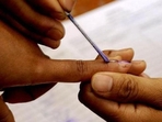 A polling official marks a voter with indelible ink prior to casting a ballot inside a polling station at Bungthuam in Mizoram.(AFP File Photo) A polling official marks a voter with indelible ink prior to casting a ballot inside a polling station at Bungthuam in Mizoram.(AFP File Photo)