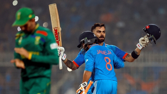 Virat Kohli celebrates with Ravindra Jadeja after reaching his 49th century, equalizing with Sachin Tendulkar's record of most number of ODI centuries(REUTERS)