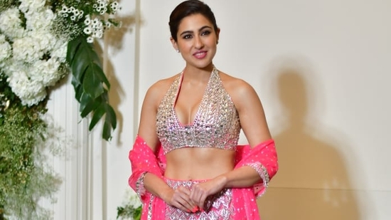Sara Ali Khan arrived for Manish Malhotra's party in a pink and silver lehenga. Her brother Ibrahim Ali Khan was also spotted but they chose to pose separately. Sara called herself “Bhartiya Barbie” on Instagram. 