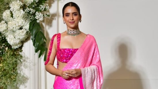 Sanya Malhotra made an impressive appearance at the party in a shimmery pink and white Manish Malhotra saree. She wore a neckpiece and earrings as well. She is currently winning praise for her performance in Shah Rukh Khan's Jawan. 