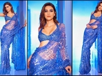 Kriti Sanon is a total stunner who can turn any outfit into a glamorous affair and her mesmerising blue saree look for Manish Malhotra's Diwali party is just wow. The National Award winning actress is not only adored for her incredible acting skills but also for her amazing fashion sense. Whether it's a traditional saree or a red carpet-worthy gown, Kriti can pull off any look to perfection. Her latest look in a six yards of grace is no exception and is sure to inspire your festive wardrobe. Scroll down to get some style tips from the diva.(Instagram/@kritisanon) Kriti Sanon is a total stunner who can turn any outfit into a glamorous affair and her mesmerising blue saree look for Manish Malhotra's Diwali party is just wow. The National Award winning actress is not only adored for her incredible acting skills but also for her amazing fashion sense. Whether it's a traditional saree or a red carpet-worthy gown, Kriti can pull off any look to perfection. Her latest look in a six yards of grace is no exception and is sure to inspire your festive wardrobe. Scroll down to get some style tips from the diva.(Instagram/@kritisanon)