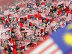 Malaysians wave the national flags during Malaysia Day celebrations in Kuala Lumpur.(File Photo) Malaysians wave the national flags during Malaysia Day celebrations in Kuala Lumpur.(File Photo)