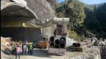 Big dimeter pipe is being pushed into the collapsed part of the tunnel to make way for the trapped labourers to come out. Big dimeter pipe is being pushed into the collapsed part of the tunnel to make way for the trapped labourers to come out.