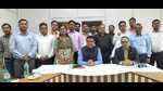 Postmaster General (PMG) of Prayagraj Region Krishna Kumar Yadav with postal officials in Prayagraj on Thursday. (HT) Postmaster General (PMG) of Prayagraj Region Krishna Kumar Yadav with postal officials in Prayagraj on Thursday. (HT)
