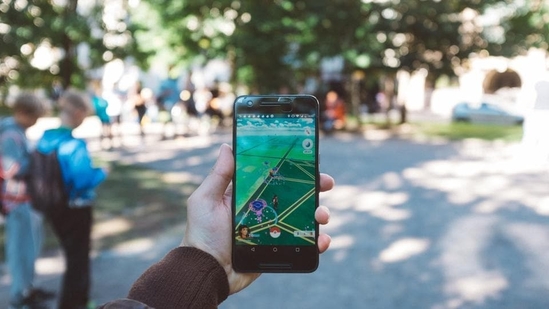Augmented reality is when apps and games overlay a real-time camera feed with images, characters and data to provide all kinds of interactive experiences.(Unsplash) Augmented reality is when apps and games overlay a real-time camera feed with images, characters and data to provide all kinds of interactive experiences.(Unsplash)