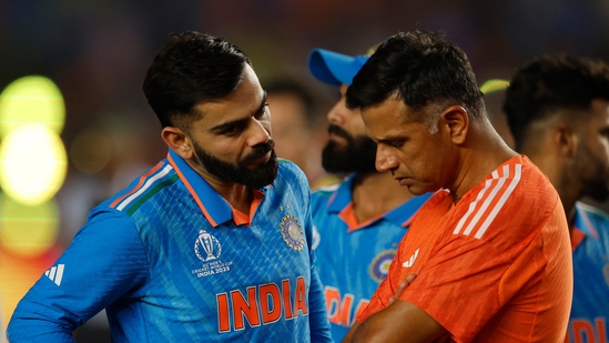 India coach Rahul Dravid and Virat Kohli look dejected during the presentation ceremony after losing the ICC Cricket World Cup final(REUTERS)