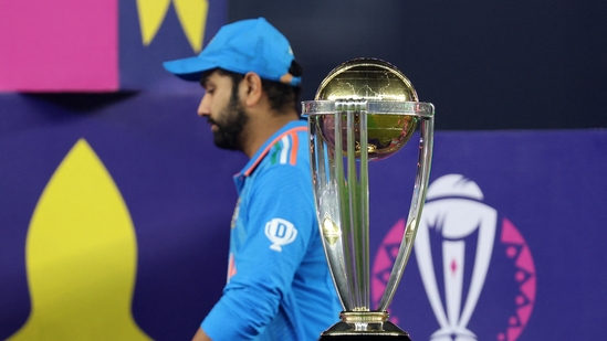 Cricket - ICC Cricket World Cup 2023 - Final - India v Australia - Narendra Modi Stadium, Ahmedabad, India - November 19, 2023 India's Rohit Sharma walks past the ICC Cricket World Cup trophy during the medal ceremony REUTERS/Amit Dave(REUTERS)