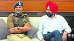 Kuldeep Singh Chahal interacting with Mandeep Singh Sidhu after taking over charge as the commissioner of police in Ludhiana. (HT Photo) Kuldeep Singh Chahal interacting with Mandeep Singh Sidhu after taking over charge as the commissioner of police in Ludhiana. (HT Photo)