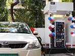 A motorist charges his electric vehicle at Vashi fuel centre charging station in Navi Mumbai (BACHCHAN KUMAR/HT PHOTO) A motorist charges his electric vehicle at Vashi fuel centre charging station in Navi Mumbai (BACHCHAN KUMAR/HT PHOTO)