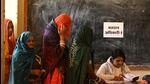 Women wait in a queue to cast their votes at a polling station during Rajasthan state assembly election in Ajmer (REUTERS) Women wait in a queue to cast their votes at a polling station during Rajasthan state assembly election in Ajmer (REUTERS)