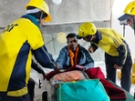 A worker is surrounded by SDRF personnel after his rescue from inside the Silkyara tunnel in Uttarkashi district of Uttarakhand. (Sourced image) A worker is surrounded by SDRF personnel after his rescue from inside the Silkyara tunnel in Uttarkashi district of Uttarakhand. (Sourced image)