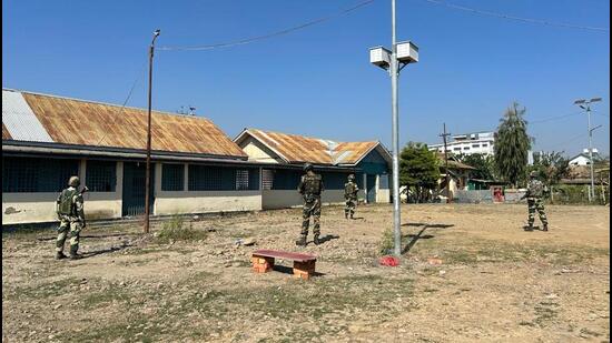 BSF personnel stand guard outside a morgue at JNIMS in Imphal on Thursday. (HT Photo) BSF personnel stand guard outside a morgue at JNIMS in Imphal on Thursday. (HT Photo)