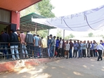 People stand in queues to cast their votes for the Rajasthan Assembly elections, on Saturday. (ANI Photo) (Dinesh Gupta) People stand in queues to cast their votes for the Rajasthan Assembly elections, on Saturday. (ANI Photo) (Dinesh Gupta)