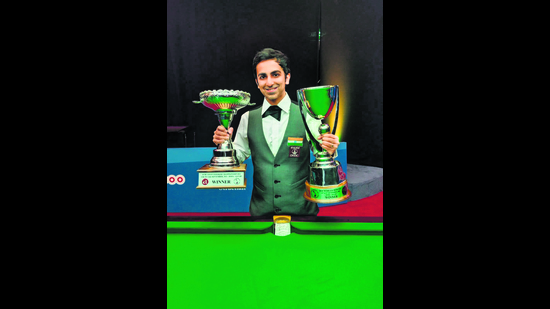 Advani with the Asian and world snooker trophies from 2021. He had a double win this year too, claiming world billiards titles in two formats. Advani with the Asian and world snooker trophies from 2021. He had a double win this year too, claiming world billiards titles in two formats.