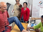 Indore, Nov 17 (ANI): Specially-abled voter Vikram Agnihotri casts his vote for the Madhya Pradesh Assembly elections, at a Polling Center in Indore on Friday. (ANI Photo)(CEOMPElections-X) Indore, Nov 17 (ANI): Specially-abled voter Vikram Agnihotri casts his vote for the Madhya Pradesh Assembly elections, at a Polling Center in Indore on Friday. (ANI Photo)(CEOMPElections-X)