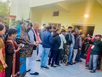 Chittorgarh, Nov 25 (ANI): Rajasthan BJP president CP Joshi wait in a queue to cast his vote for the Rajasthan Assembly elections at a polling station, in Chittorgarh on Saturday. (ANI Photo)( BJP Rajasthan X) Chittorgarh, Nov 25 (ANI): Rajasthan BJP president CP Joshi wait in a queue to cast his vote for the Rajasthan Assembly elections at a polling station, in Chittorgarh on Saturday. (ANI Photo)( BJP Rajasthan X)