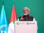 Prime Minister Narendra Modi during a high-level segment on day two of the COP28 climate conference in Dubai. (Bloomberg)(HT_PRINT) Prime Minister Narendra Modi during a high-level segment on day two of the COP28 climate conference in Dubai. (Bloomberg)(HT_PRINT)