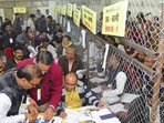 Counting of votes for the Madhya Pradesh Assembly elections underway at a centre in Jabalpur. (PTI)(HT_PRINT) Counting of votes for the Madhya Pradesh Assembly elections underway at a centre in Jabalpur. (PTI)(HT_PRINT)