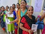 Women in queue to vote for the Rajasthan Assembly elections. Women in queue to vote for the Rajasthan Assembly elections.