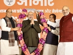 Prime Minister Narendra Modi being felicitated by top BJP leaders after the assembly election results on Sunday. Prime Minister Narendra Modi being felicitated by top BJP leaders after the assembly election results on Sunday.