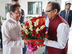 Madhya Pradesh chief minister Shivraj Singh Chouhan being greeted by Congress state president Kamal Nath after BJP's victory in the state assembly elections in Bhopal on Monday. (PTI) Madhya Pradesh chief minister Shivraj Singh Chouhan being greeted by Congress state president Kamal Nath after BJP's victory in the state assembly elections in Bhopal on Monday. (PTI)